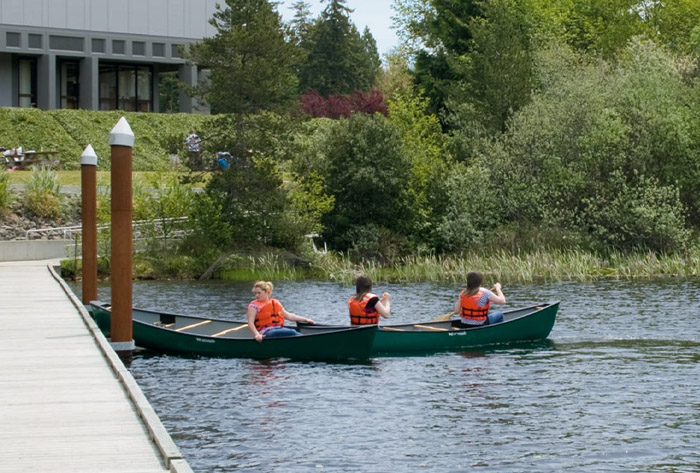 students in canoe at Southwestern Oregon Community College