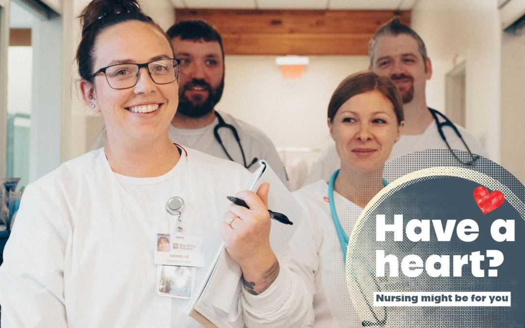 four nurses walking down a hallway