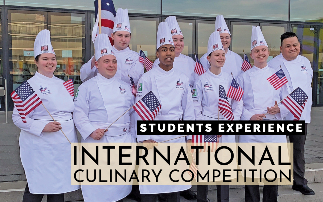 image of group of people in chef uniforms holding American flags