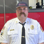 Head shot of Mick Sneddon